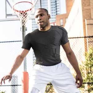 TUOY Men Padded Compression Shirt Chest Protector Size L Brand New With Tags.